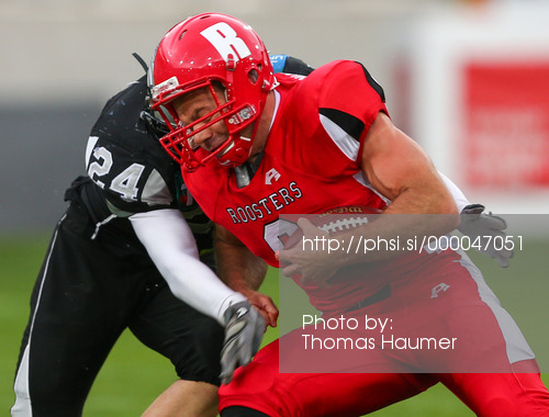 Fabian Seeber, (SWARCO Raiders Tirol, LB, #24) and Roberto Ciasulli, (Helsinki Roosters, WR, #6) during quarterfinal match of European Football League between Swarco Raiders Tirol, Innsbruck, Austria, and Helsinki Roosters, Finland. Quarterfinal match of European Football League between Swarco Raiders Tirol and Helsinki Roosters was played on Saturday, 25th of May 2013 in Innsbruck, Austria.
