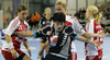 Liudmila Bodnieva (no.14) of Krim (M) fighting with Ania Rosler (no.15) of 1.FC Nurnberg (L) and Miriam Simakova (no.14) of 1.FC Nurnberg (R) during match of 2nd round of EHF Women Handball Champions League between RK Krim, Ljubljana, Slovenia and 1.FC Nurnberg, Germany. Match ended with victory of 1.FC Nurnberg, who defeated RK Krim with 30:31. Match between RK Krim and 1.FC Nurnberg was played in Tivoli Arena in Ljubljana, Slovenia on 3. November 2007.
