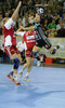 Manuela Hrnjic (no.26) of Krim (R) shooting on goal next to Simone Luber (no.22) of 1.FC Nurnberg (M) and Miriam Simakova (no.14) of 1.FC Nurnberg (L) during match of 2nd round of EHF Women Handball Champions League between RK Krim, Ljubljana, Slovenia and 1.FC Nurnberg, Germany. Match ended with victory of 1.FC Nurnberg, who defeated RK Krim with 30:31. Match between RK Krim and 1.FC Nurnberg was played in Tivoli Arena in Ljubljana, Slovenia on 3. November 2007.
