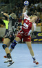 Miriam Simakova (no.14) of 1.FC Nurnberg (R) shooting over Anja Freser (no.11) of Krim (L) during match of 2nd round of EHF Women Handball Champions League between RK Krim, Ljubljana, Slovenia and 1.FC Nurnberg, Germany. Match ended with victory of 1.FC Nurnberg, who defeated RK Krim with 30:31. Match between RK Krim and 1.FC Nurnberg was played in Tivoli Arena in Ljubljana, Slovenia on 3. November 2007.
