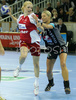 Petra Popluharova (no.17) of 1.FC Nurnberg (L) trying to score, while Gabriella Kindl (no.77) of Krim (R) is trying to hinder her during match of 2nd round of EHF Women Handball Champions League between RK Krim, Ljubljana, Slovenia and 1.FC Nurnberg, Germany. Match ended with victory of 1.FC Nurnberg, who defeated RK Krim with 30:31. Match between RK Krim and 1.FC Nurnberg was played in Tivoli Arena in Ljubljana, Slovenia on 3. November 2007.
