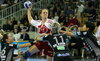 Kerstin Wohlbold (no.13) of 1.FC Nurnberg (M) shooting on goal over Manuela Hrnjic (no.26) of Krim (L), Anja Freser (no.11) of Krim (2nd from R) and Liudmila Bodnieva (no.14) of Krim (R) during match of 2nd round of EHF Women Handball Champions League between RK Krim, Ljubljana, Slovenia and 1.FC Nurnberg, Germany. Match ended with victory of 1.FC Nurnberg, who defeated RK Krim with 30:31. Match between RK Krim and 1.FC Nurnberg was played in Tivoli Arena in Ljubljana, Slovenia on 3. November 2007.
