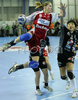 Franziska Beck (no.9) of 1.FC Nurnberg (L( shooting on goal while Maja Zrnec (no.44) of Krim (M) and Liudmila Bodnieva (no.14) of Krim (R) are trying to block her during match of 2nd round of EHF Women Handball Champions League between RK Krim, Ljubljana, Slovenia and 1.FC Nurnberg, Germany. Match ended with victory of 1.FC Nurnberg, who defeated RK Krim with 30:31. Match between RK Krim and 1.FC Nurnberg was played in Tivoli Arena in Ljubljana, Slovenia on 3. November 2007.
