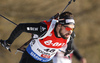 Benjamin Weger of Switzerland skiing during the Men pursuit race of IBU Biathlon World Cup in Hochfilzen, Austria. Men sprint race of IBU Biathlon World cup was held on Saturday, 12th of December 2015 in Hochfilzen, Austria.
