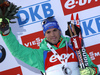 Simon Schempp of Germany celebrates his medal won in the Men pursuit race of IBU Biathlon World Cup in Hochfilzen, Austria. Men pursuit race of IBU Biathlon World cup was held on Saturday, 12th of December 2015 in Hochfilzen, Austria.
