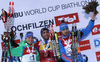 Simon Schempp of Germany (L), winner Martin Fourcade (M) and Anton Shipulin of Russia (R) celebrating their medals won in the Men pursuit race of IBU Biathlon World Cup in Hochfilzen, Austria. Men pursuit race of IBU Biathlon World cup was held on Saturday, 12th of December 2015 in Hochfilzen, Austria.
